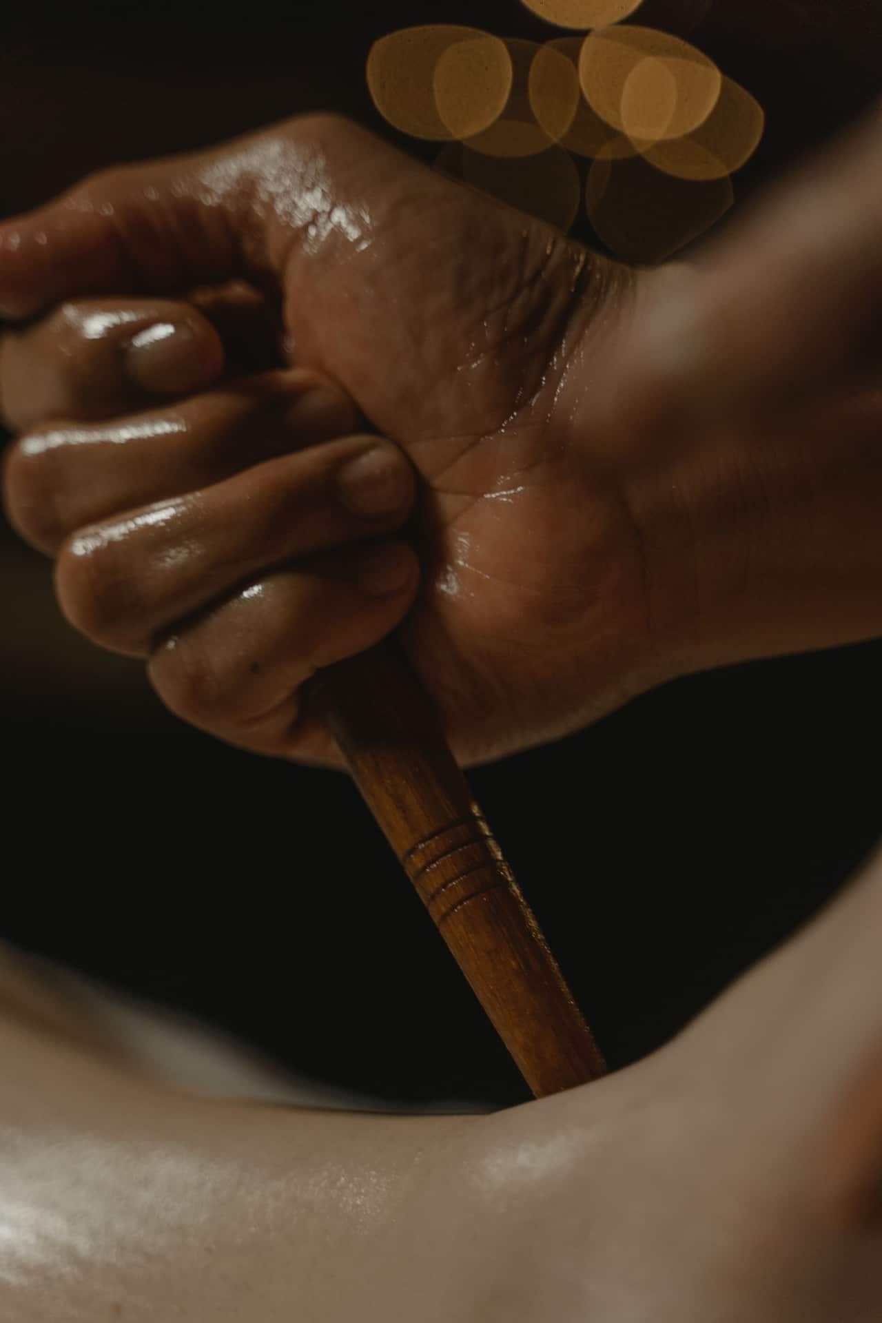 Massage tools and herbal oils setup in an Indian spa environment