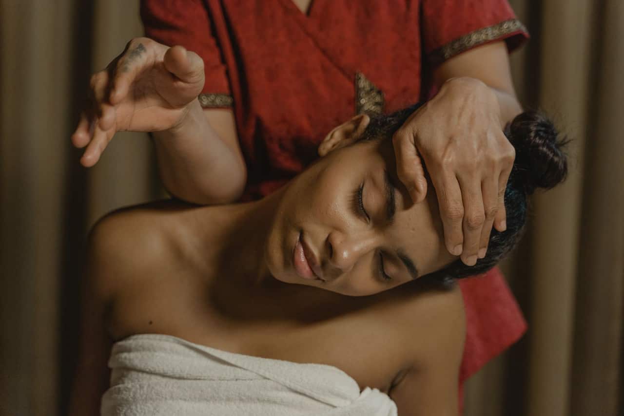 Relaxed spa guest in a trusted Indian wellness treatment environment